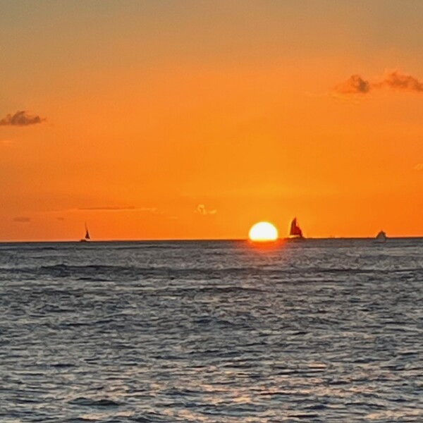 sunset at see from the south shore of Oahu Hawaii on Waikiki Beach